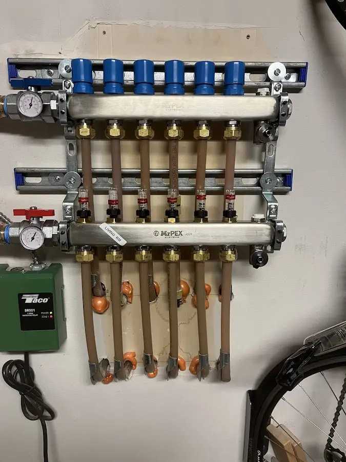 Plumber performing Water Heater Repair at a residential property in Provo